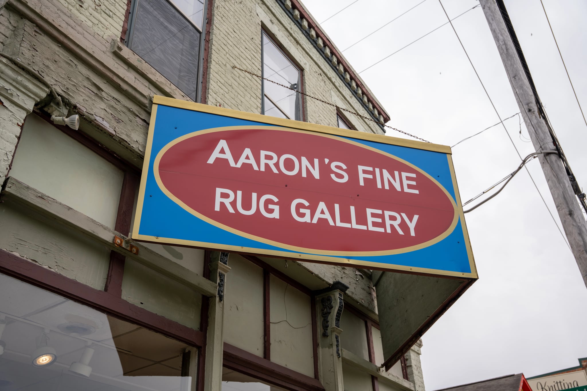 Aaron's Fine Rug Gallery & Sarah Leitch Art - Sign